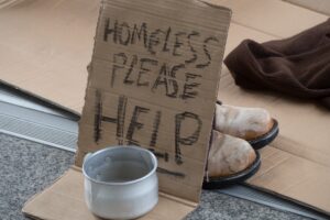 Homeless please help cardboard sign